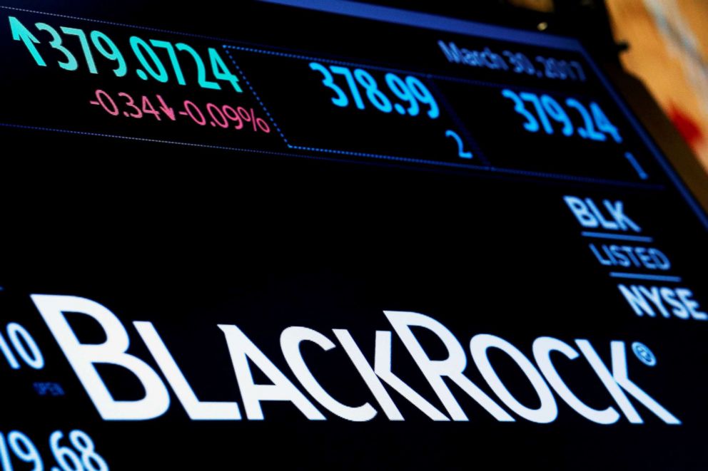PHOTO: The company logo and trading information for BlackRock is displayed on a screen on the floor of the New York Stock Exchange (NYSE) in New York, March 30, 2017. 