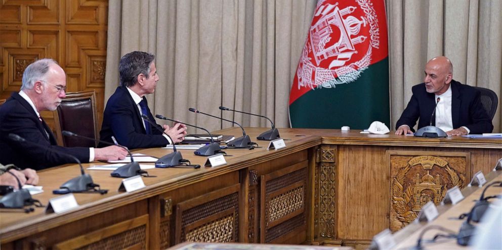 PHOTO: Afghan President Ashraf Ghani, right, meets with U.S. Secretary of State Antony Blinken, second left, at the presidential palace in Kabul, Afghanistan, April 15, 2021.