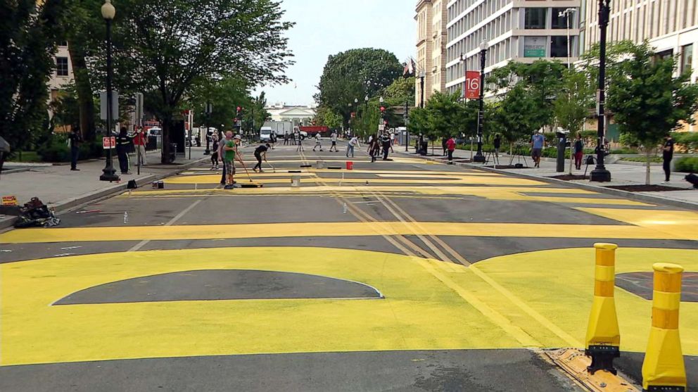 PHOTO: Large yellow letters in support of the Black Live Matter movement are painted on 16th street, just blocks from the White House, June 5, 2020, in Washington, D.C.