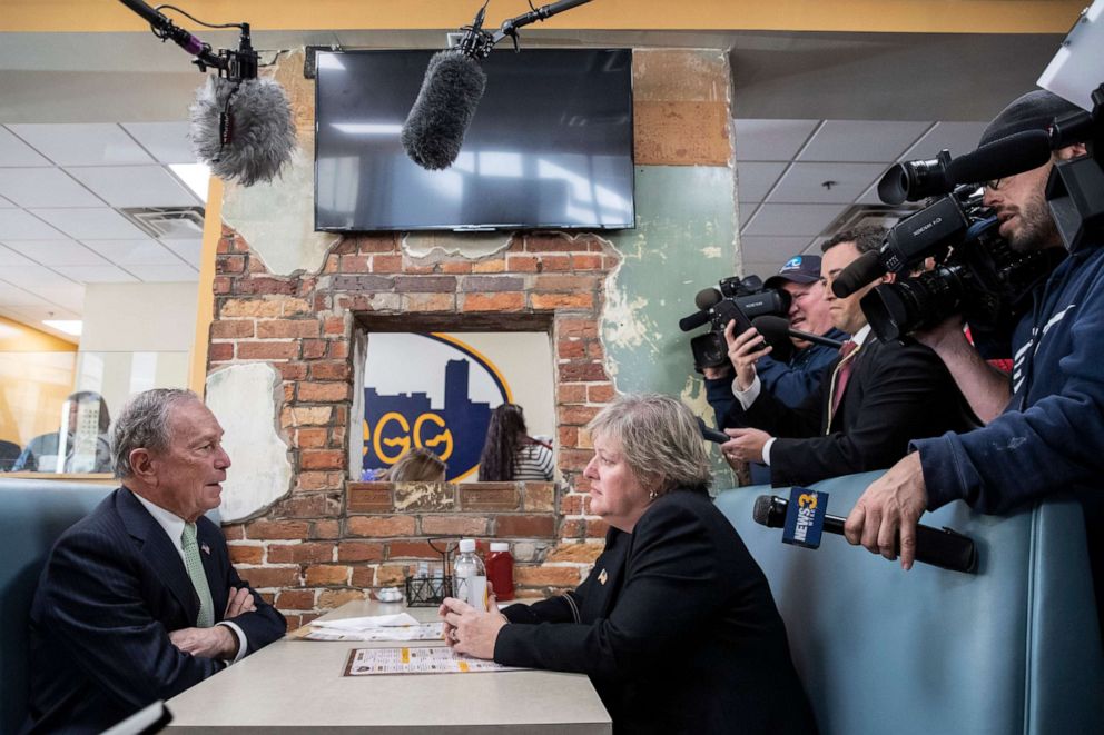 PHOTO: Former New York City Mayor and newly announced Democratic presidential candidate Michael Bloomberg meets with Virginia House Delegate-Elect Nancy Guy at a coffee shop on Nov. 25, 2019, in Norfolk, Va.