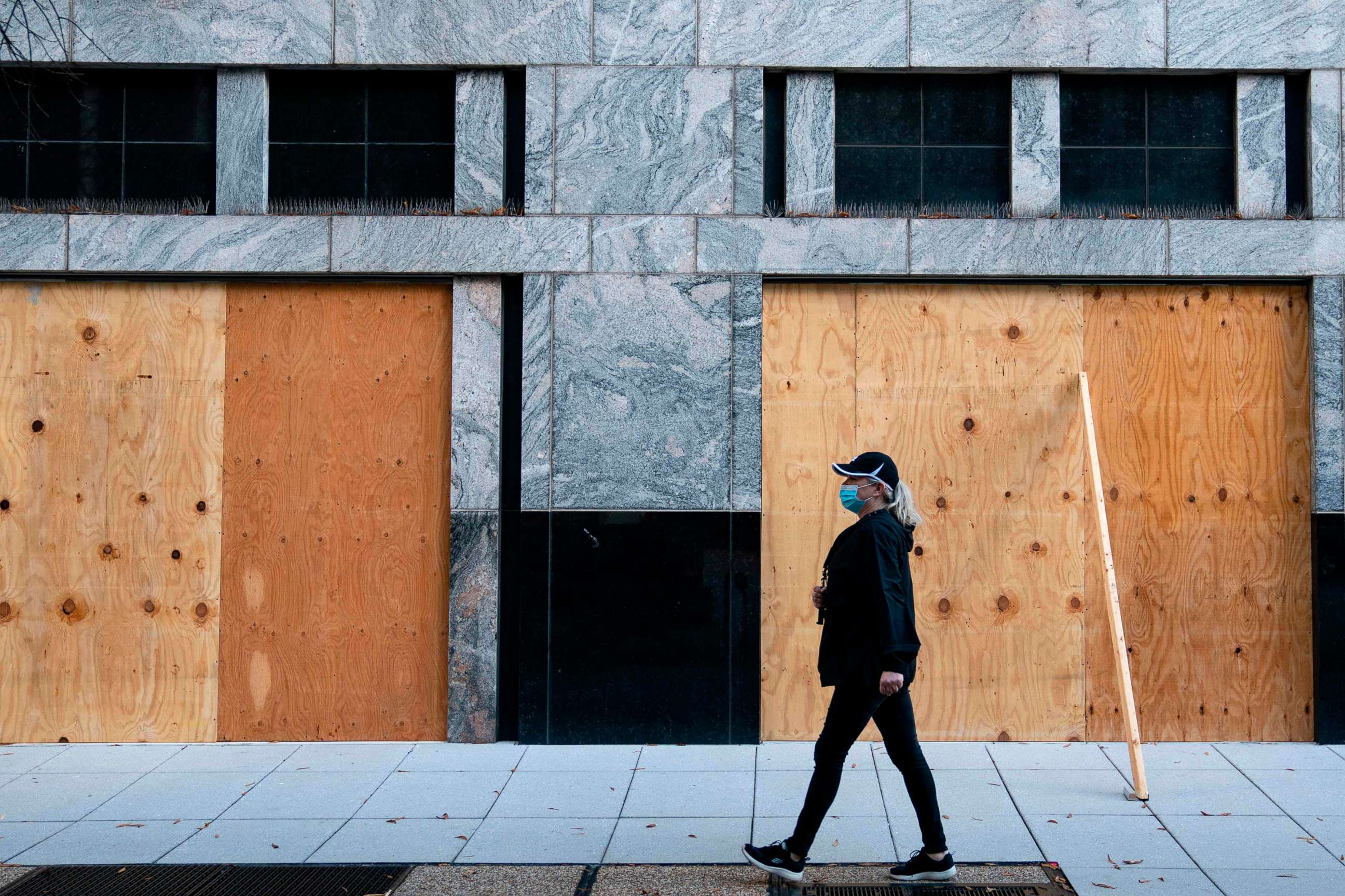 PHOTO: Wooden boards protect a Starbucks location near the White House on Oct. 31, 2020 in Washington, D.C.