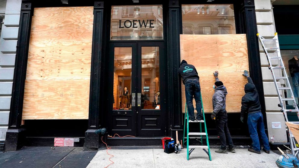 PHOTO: Workers in the Soho area of New York prepare their businesses by boarding up on Nov. 2, 2020, as they make plans for potential civil unrest during the presidential race for the White House.