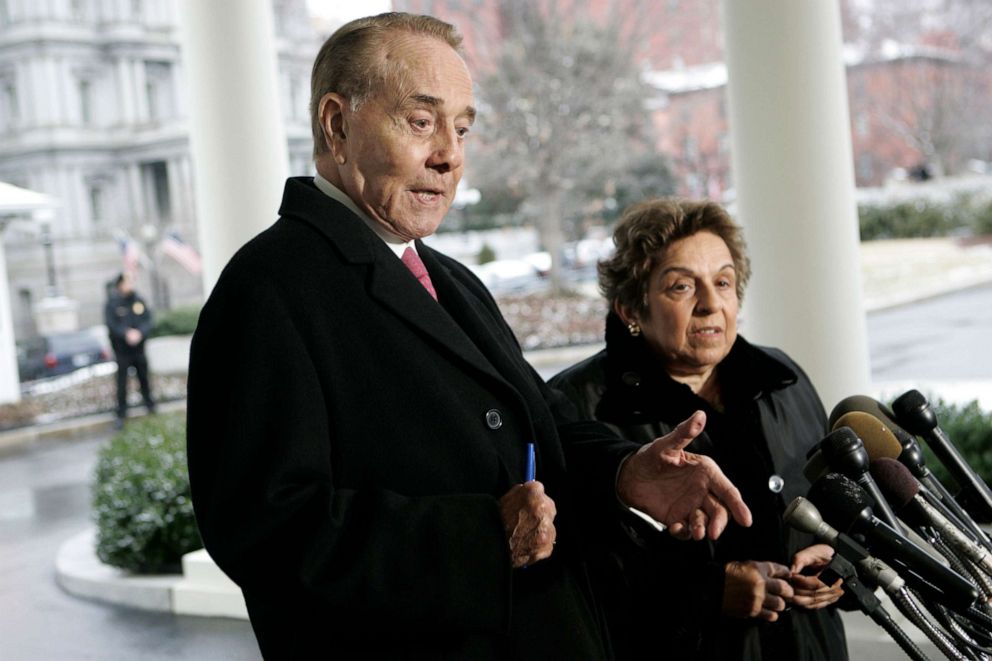 PHOTO: Former Sen. Bob Dole, left, and former Health and Human Services Secretary Donna Shalala talk to reporters outside the White House in Washington, March 7, 2007, after meeting with President Bush.