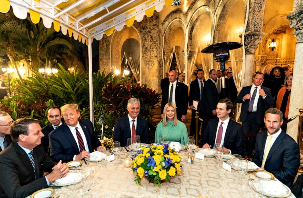 PHOTO: President Donald Trump hosts a working dinner for Brazil’s President Jair Bolsonaro, left, on March 7, 2020, at Mar-a-Lago in Palm Beach, Fla.