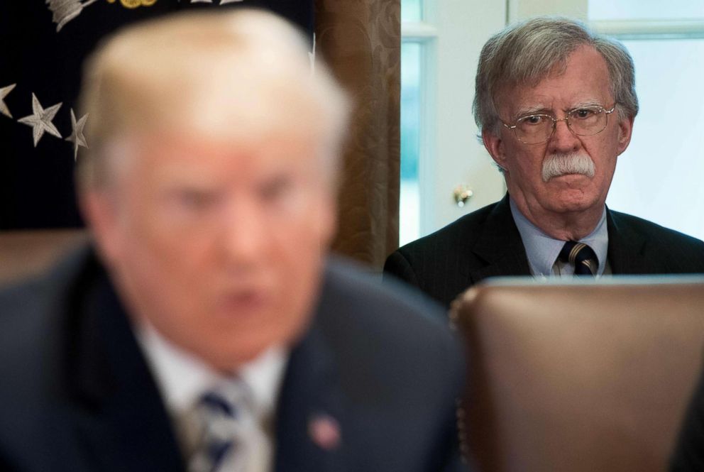 PHOTO: President Donald Trump speaks alongside National Security Adviser John Bolton (R) during a Cabinet Meeting in the White House, May 9, 2018. 