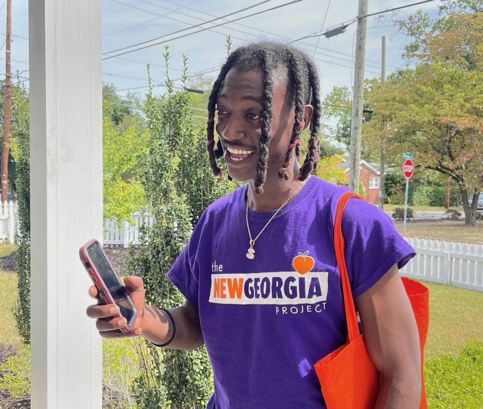 PHOTO: Shamarius Bolton knocks on doors for the New Georgia Project to try to engage 2022 voters, in Georgia.