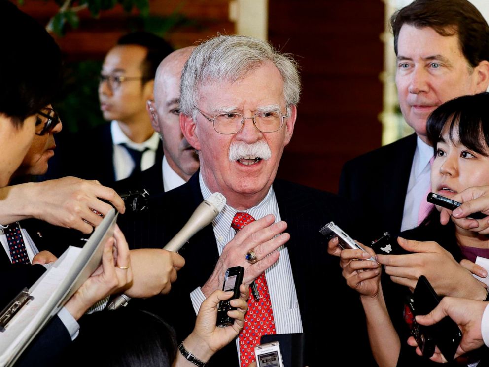 PHOTO: National Security Adviser John Bolton is surrounded by reporters at the prime minister's official residence in Tokyo, May 24, 2019.