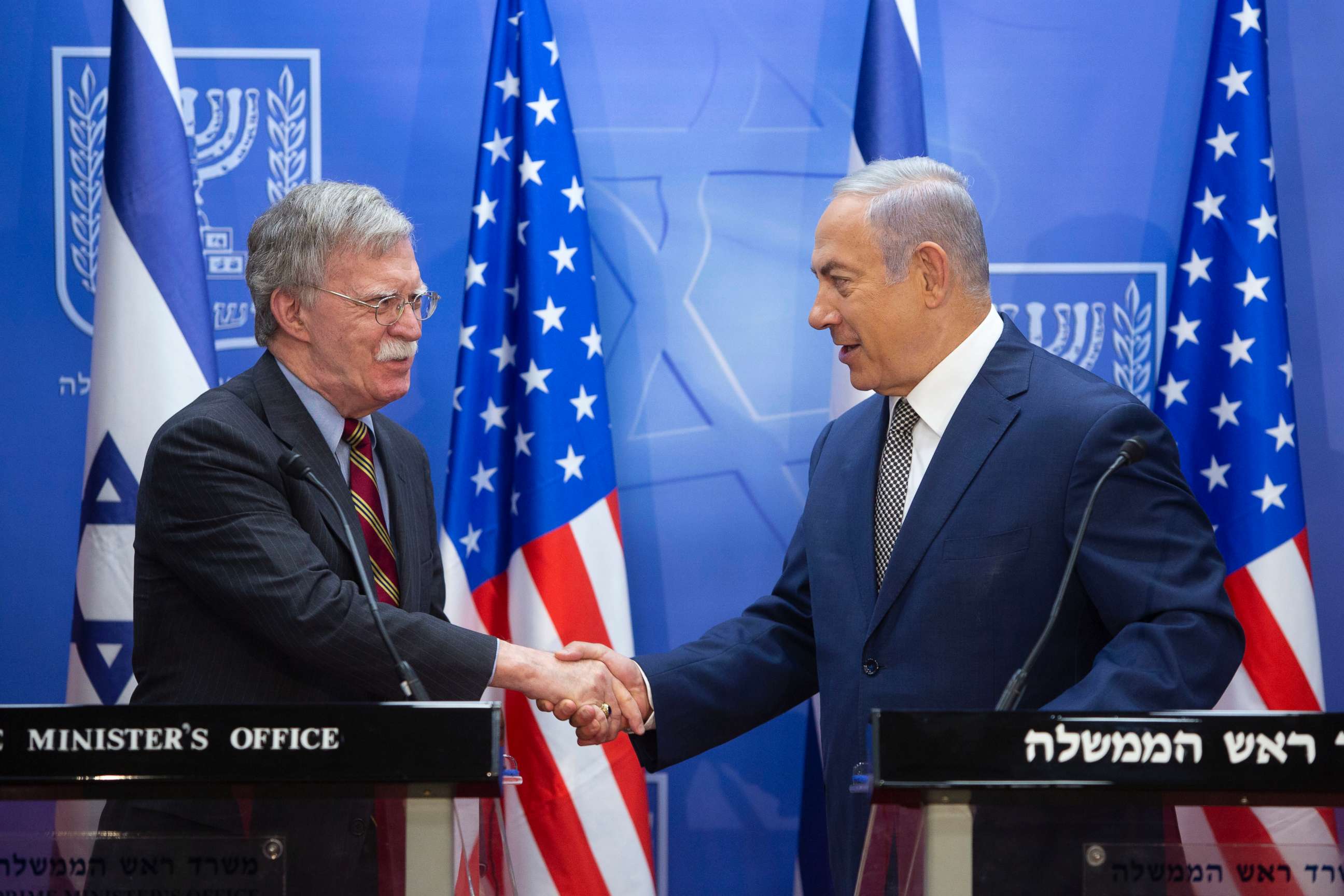 PHOTO: Israeli Prime Minister Benjamin Netanyahu, right, shakes hands with U.S. national security adviser John Bolton during their meeting at the Prime Minister's office in Jerusalem, Aug. 20, 2018.