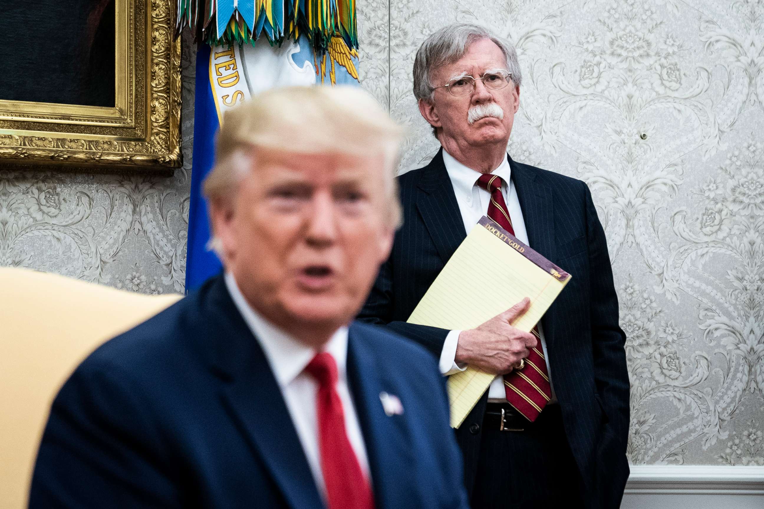 PHOTO: National Security Advisor John R. Bolton listens as President Donald J. Trump meets with Prime Minister of the Netherlands Mark Rutte in the Oval Office at the White House, July 18, 2019.
