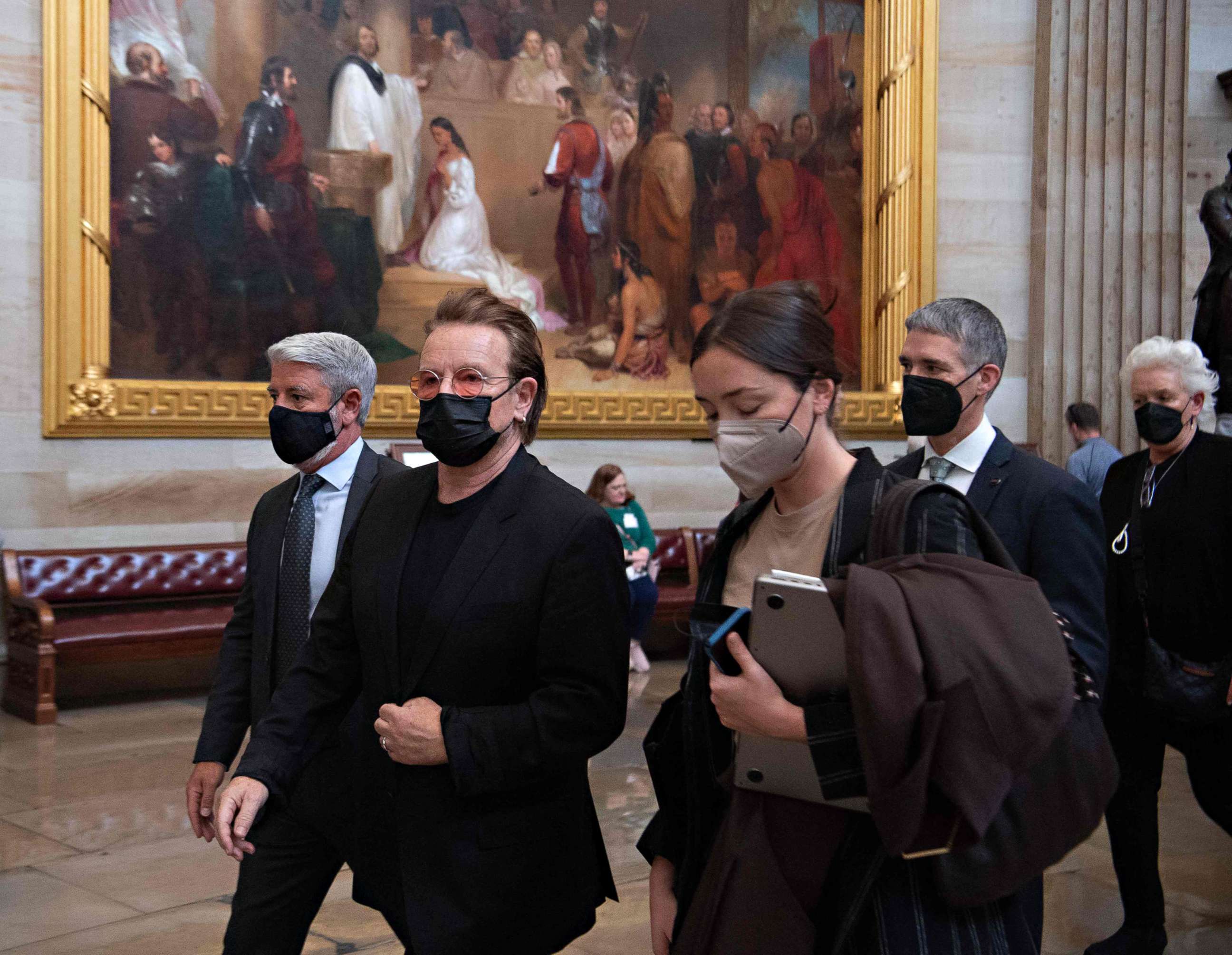 PHOTO: Bono, lead singer of U2, walks through through the Rotunda on Capitol Hill between meetings with US lawmakers about obtaining supplemental funding for the global COVID response, in Washington, March 30, 2022.