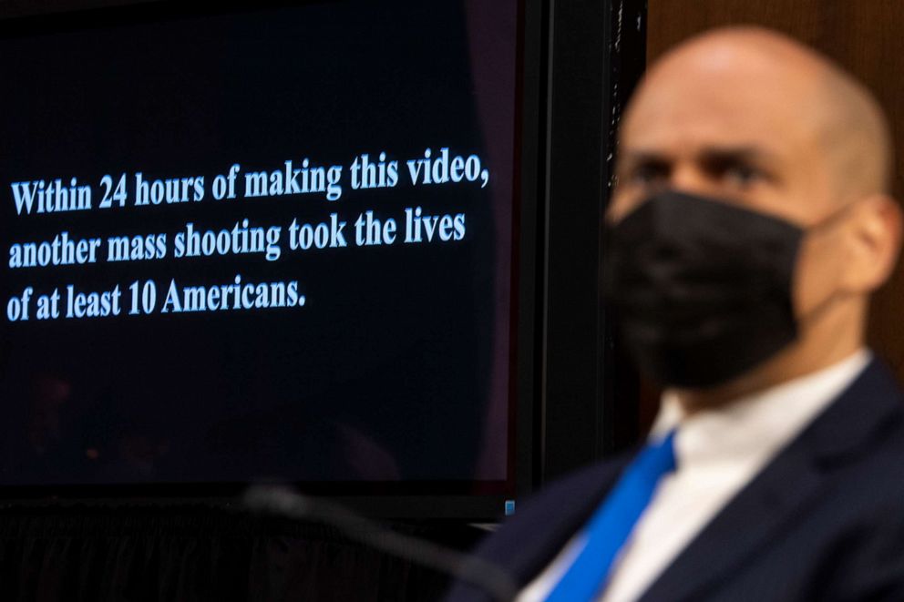 PHOTO: Sen. Cory Booker looks on as a video highlighting recent mass shootings in America is played during the Senate Judiciary Committee hearing at the Capitol in Washington on March 23, 2021.