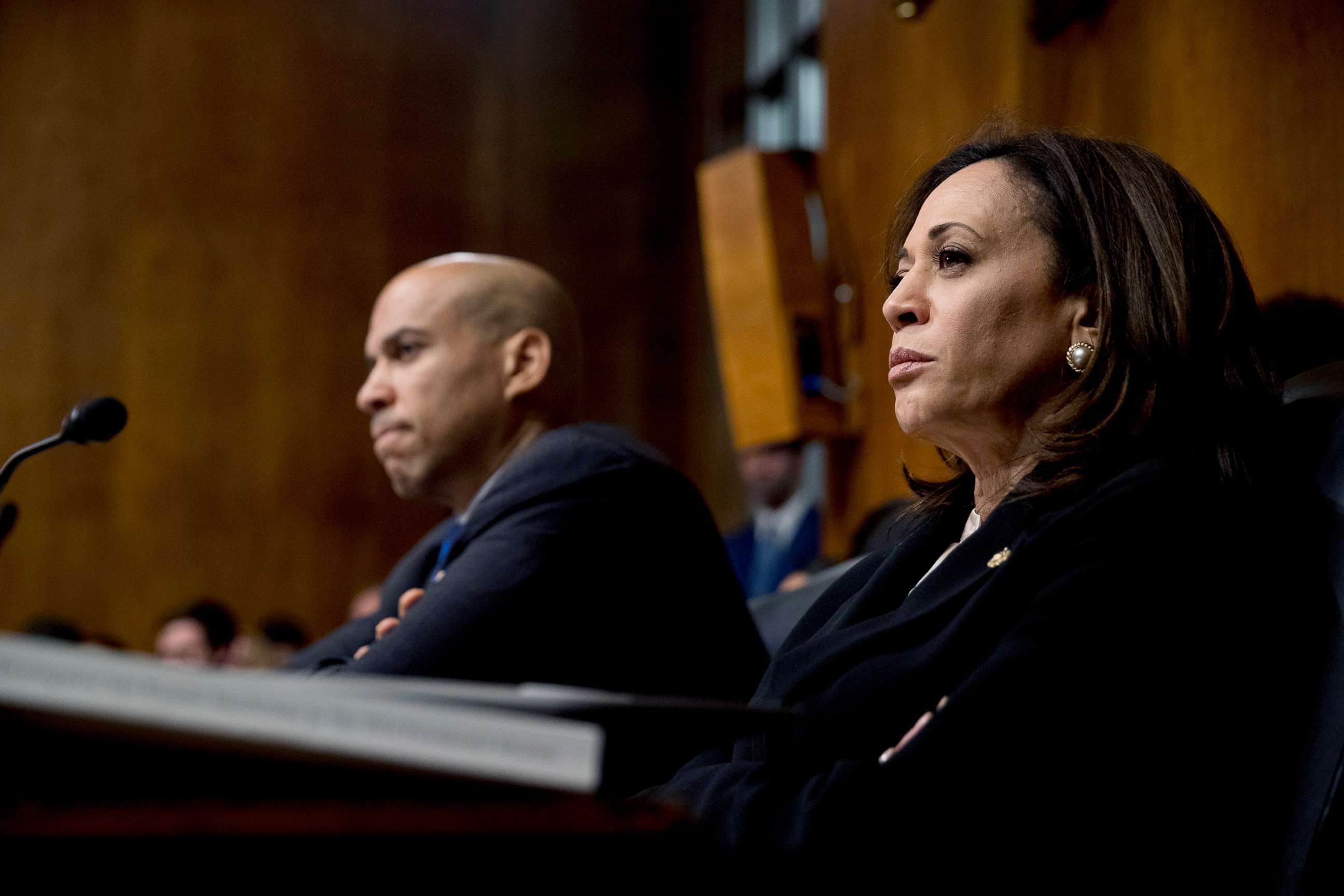 PHOTO: Democratic presidential candidates Sen. Cory Booker, left, and Sen. Kamala Harris, right, listen as Attorney General William Barr testifies during a Senate Judiciary Committee hearing on Capitol Hill in Washington, D.C., May 1, 2019.