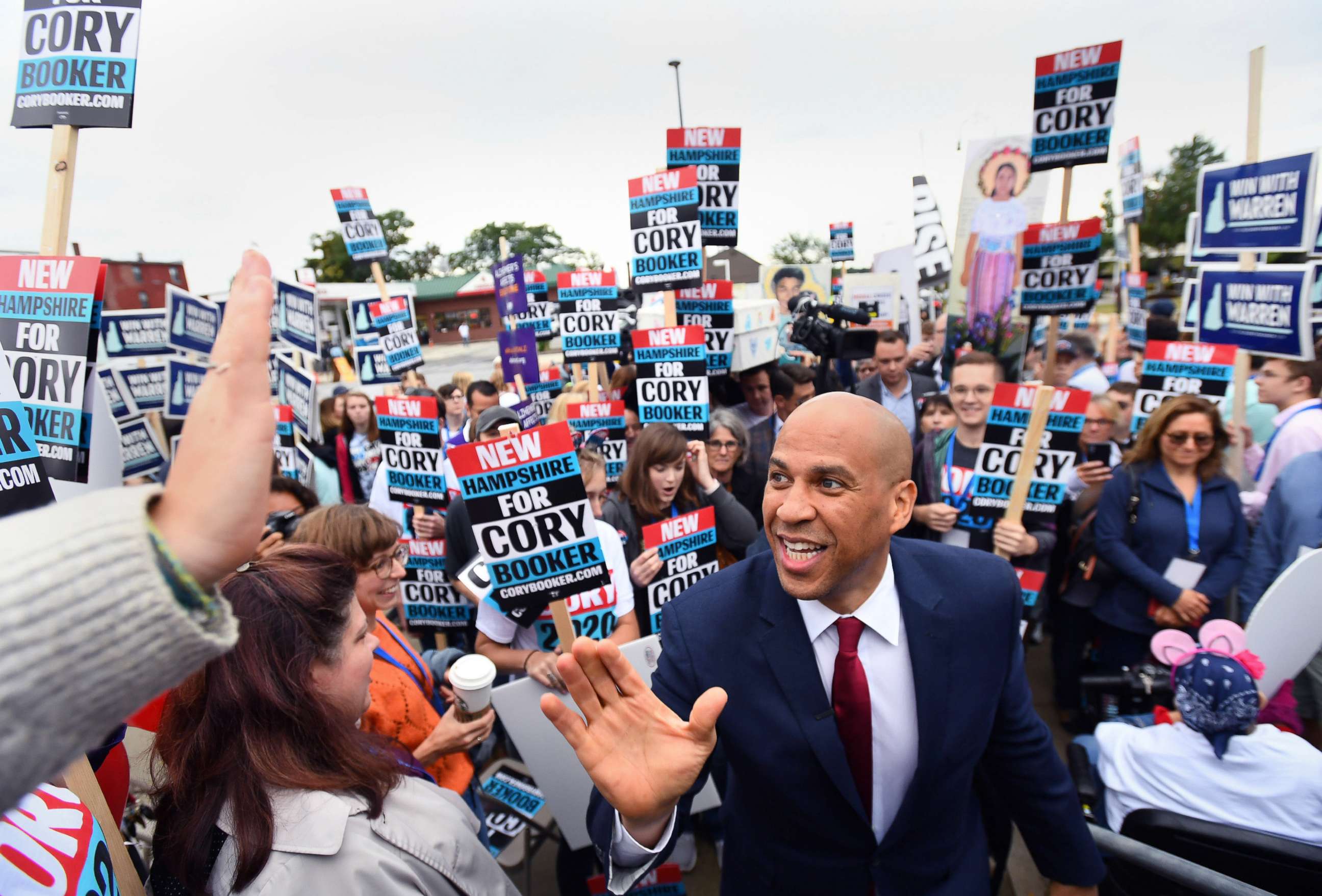 PHOTO: Democratic presidential candidate and Senator Cory Booker greets supporters at the New Hampshire Democratic Party state convention in Manchester, N.H., Sept. 7, 2019.