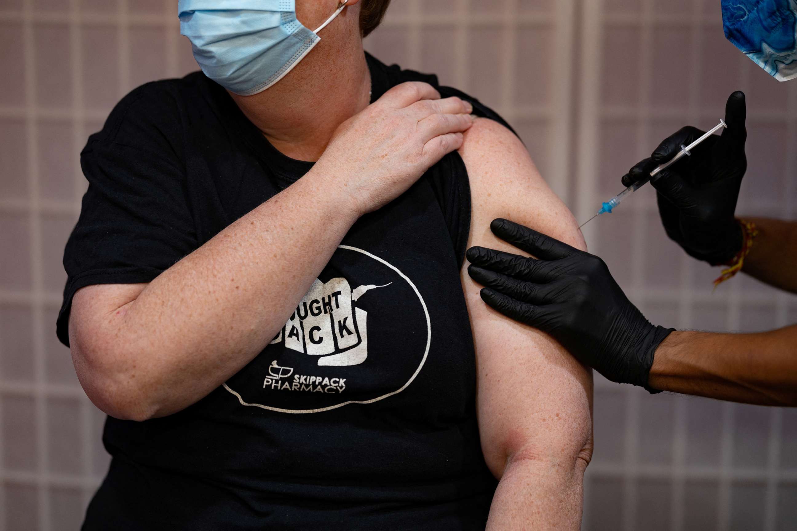 PHOTO: Amy Bagley receives the Moderna coronavirus disease (COVID-19) booster vaccine targeting BA.4 and BA.5 Omicron sub variants at Skippack Pharmacy in Schwenksville, Penn., Sept. 8, 2022.