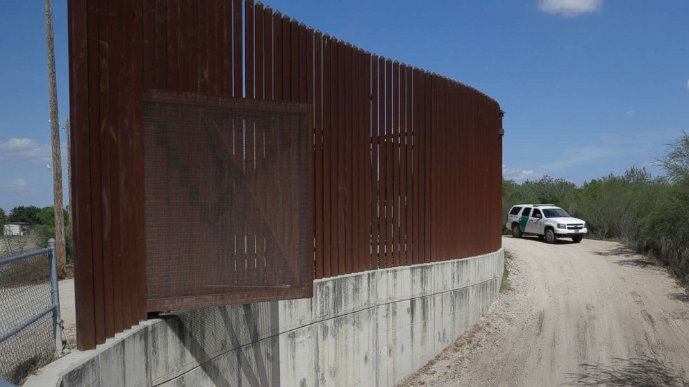 PHOTO: A U.S. Customs and Border Patrol vehicle passes along a section of border levee wall in Hidalgo, Texas, Aug. 11, 2017.