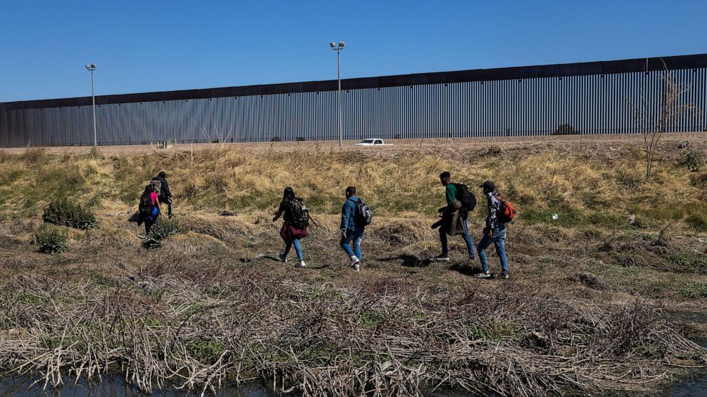PHOTO: Hundreds of Venezuelan migrants approach the U.S. Border Patrol by foot to cross the border and apply for humanitarian asylum in United States, April 10, 2023, in Ciudad Juarez, Mexico.