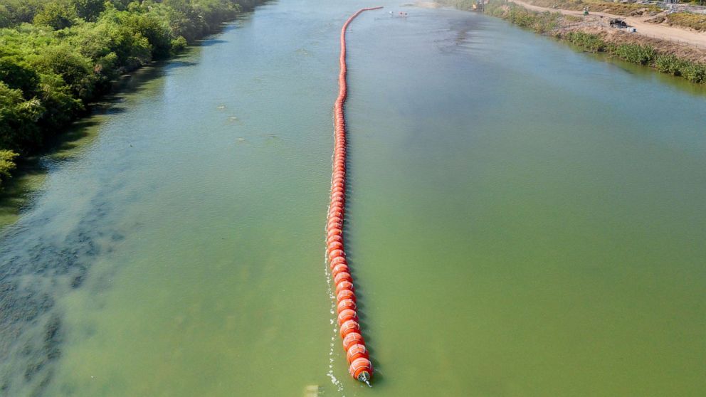 PHOTO: Buoy barriers are installed and situated in the middle of the Rio Grande river, July 18, 2023, in Eagle Pass, Texas.