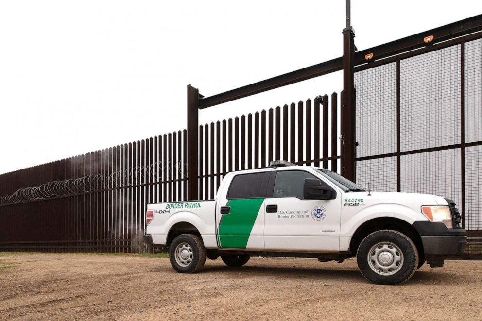 PHOTO: A U.S. Customs and Border Protection vehicle drives at the gate of the border fence at the U.S.-Mexican border on Jan. 15, 2019, in McAllen, Texas.