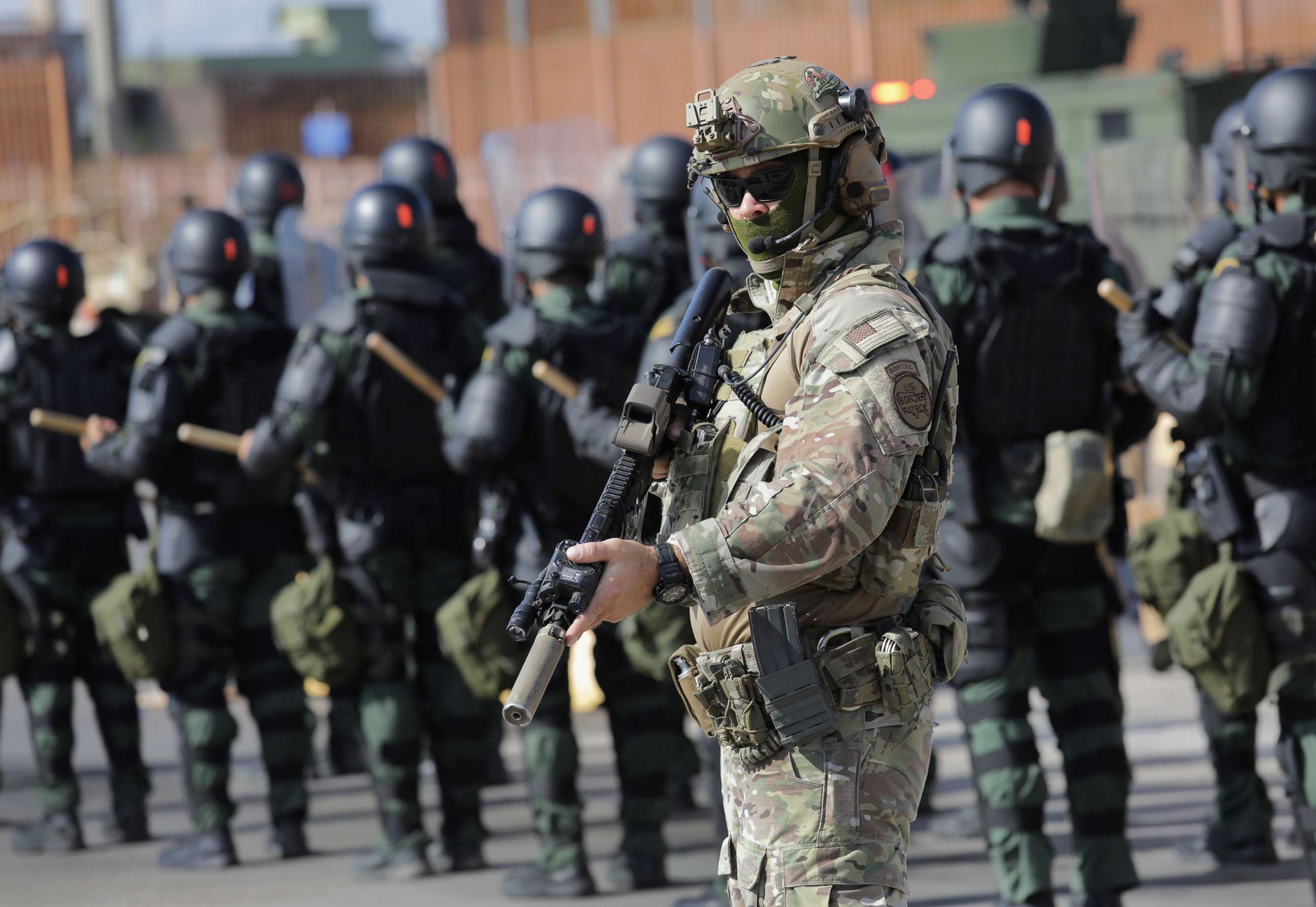 PHOTO: A Border Patrol agent and fellow U.S. Customs and Border Protection personnel take part in a training exercise at the U.S.-Mexico border, Nov. 5, 2018, in Hidalgo, Texas.