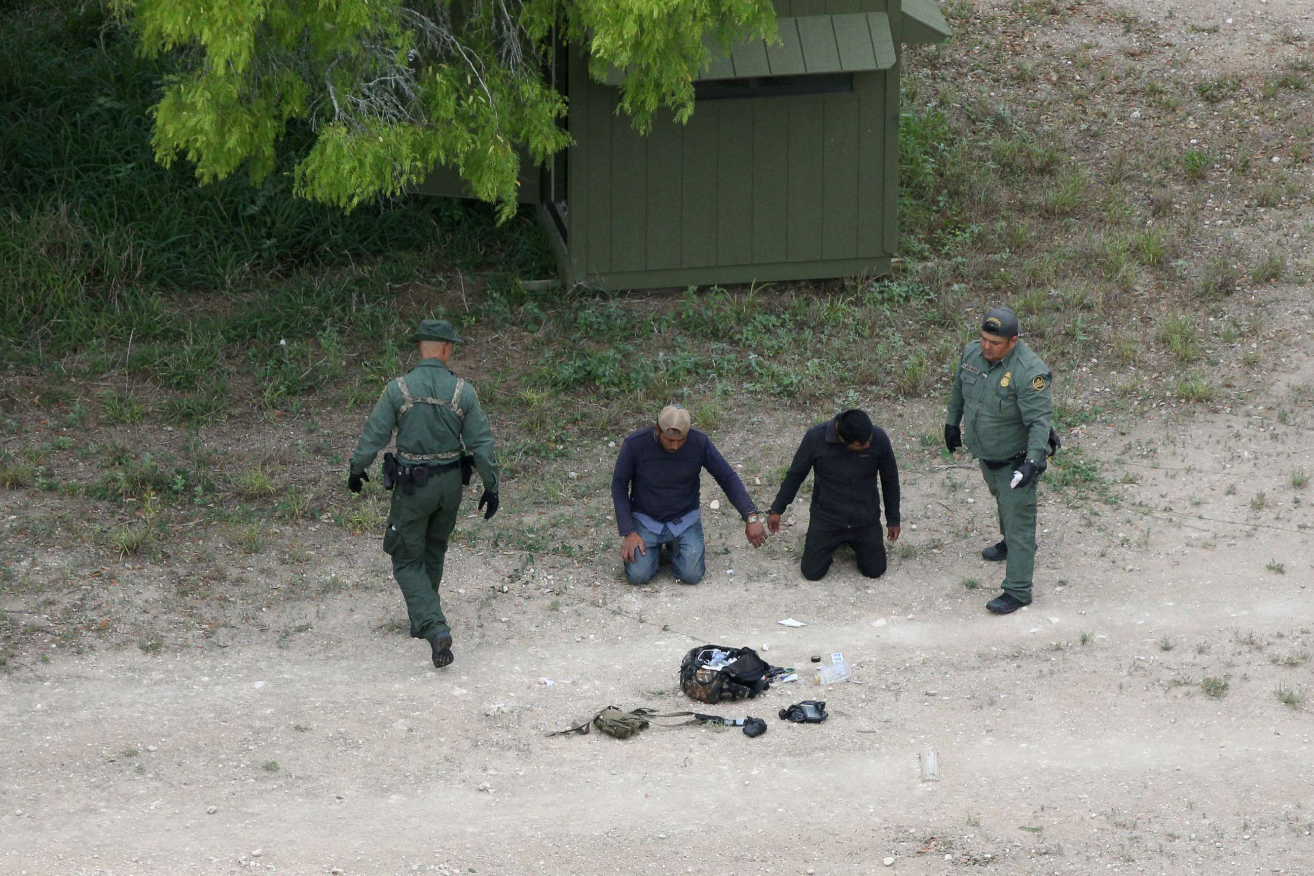 PHOTO: Border patrol agents apprehend people who illegally crossed the border from Mexico into the U.S. in the Rio Grande Valley sector, near Falfurrias, Texas, April 4, 2018.