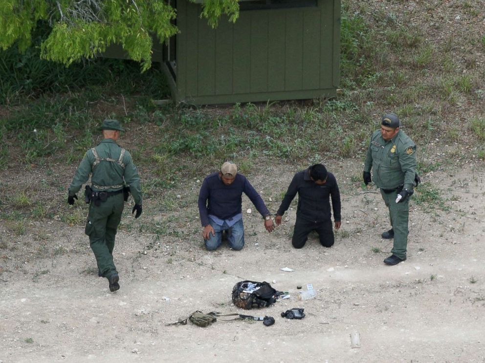 PHOTO: Border patrol agents apprehend people who illegally crossed the border from Mexico into the U.S. in the Rio Grande Valley sector, near Falfurrias, Texas, April 4, 2018.