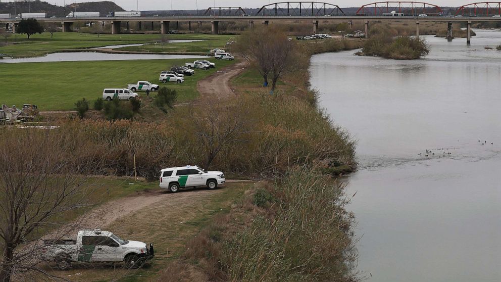 PHOTO: Law Enforcement and Border Patrol vehicles are seen as they line the banks of the Rio Grande at the U.S.-Mexico border on Feb. 08, 2019, in Piedras Negras, Texas.