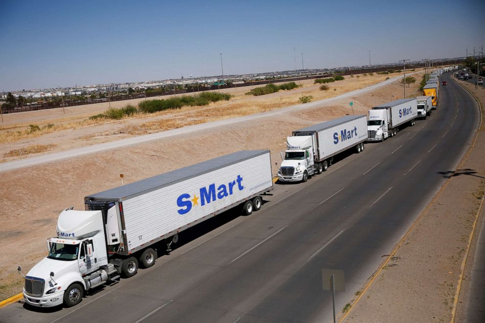 PHOTO: Trucks wait in a queue to cross into the United States near in the Cordova of the Americas International border bridge connecting the city of Ciudad Juarez to El Paso, Texas, April 13, 2022. 