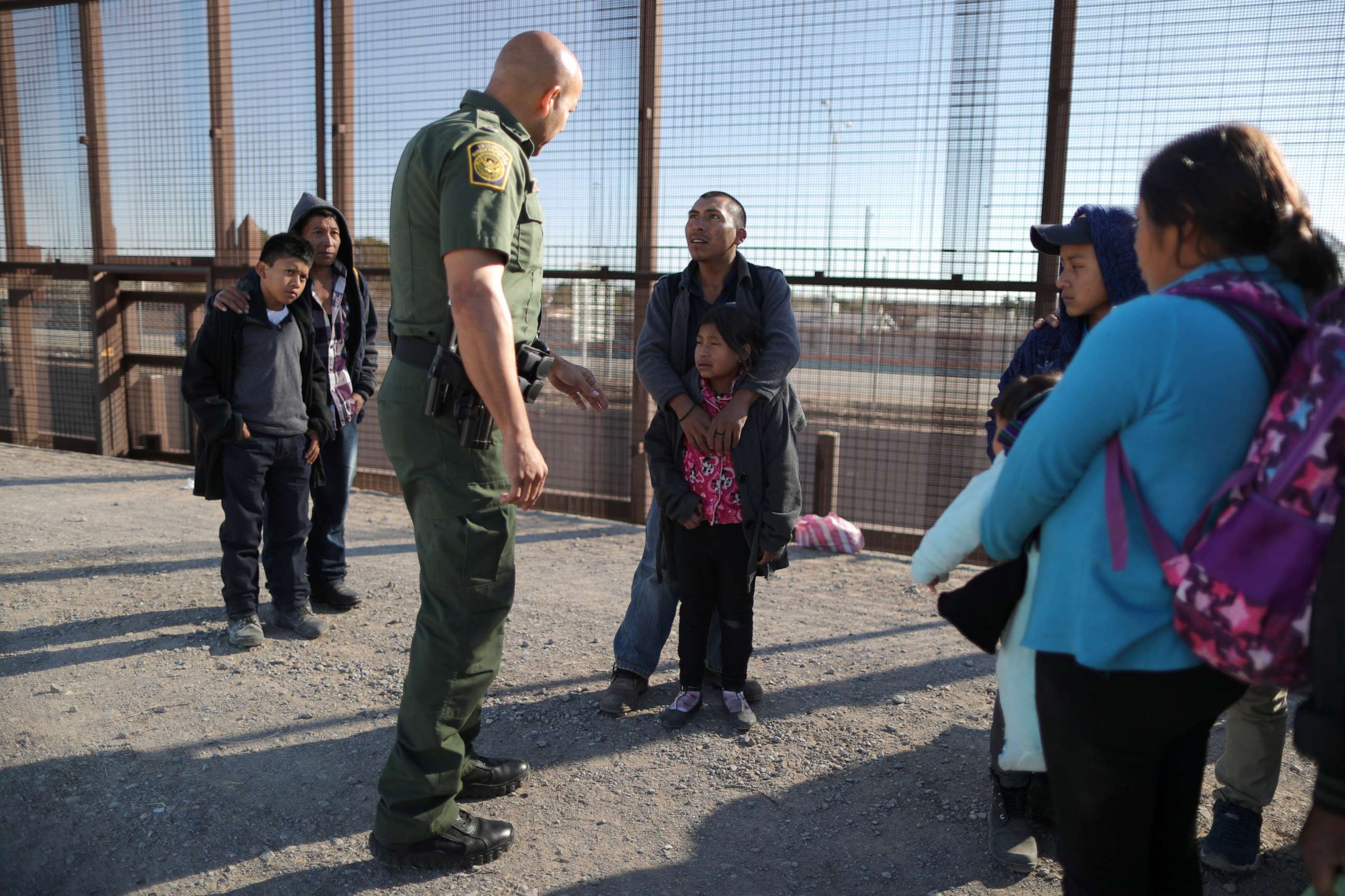 PHOTO: A group of Central American migrants is questioned about their children's health after surrendering to U.S. Border Patrol Agents south of the U.S.-Mexico border fence in El Paso, Texas, March 6, 2019.