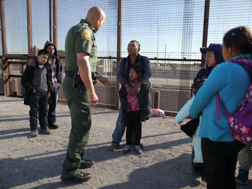 PHOTO: A group of Central American migrants is questioned about their childrens health after surrendering to U.S. Border Patrol Agents south of the U.S.-Mexico border fence in El Paso, Texas, March 6, 2019.