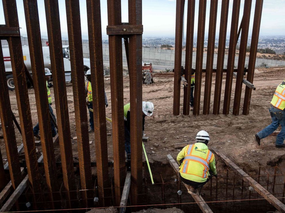 PHOTO: A construction crew works on replacing the U.S.-Mexico border fence near Tijuana, Mexico, Jan. 9, 2019.