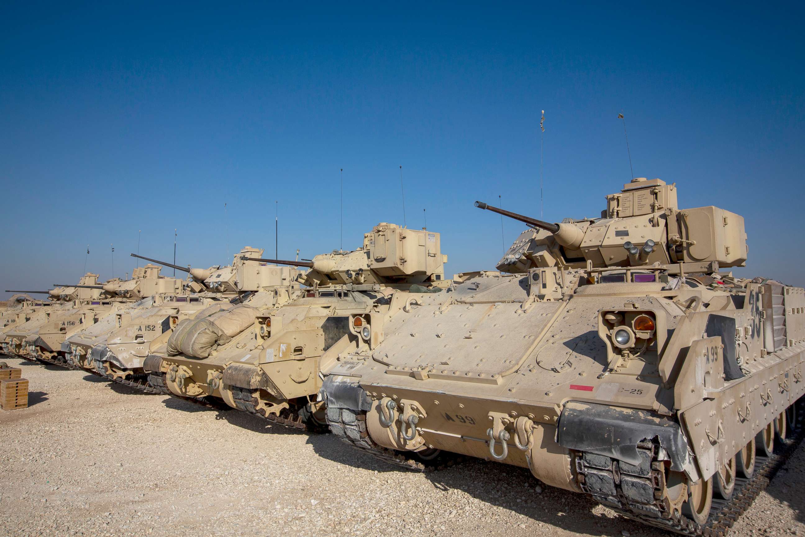 PHOTO: Bradley fighting vehicles are parked at a US military base at an undisclosed location in Northeastern Syria, Nov. 11, 2019. 