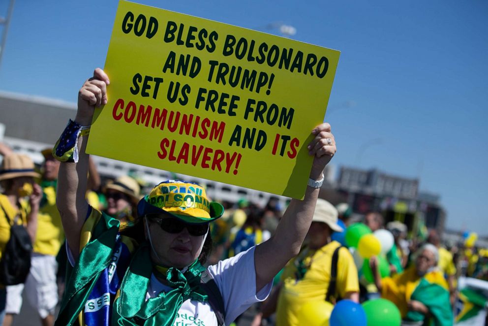 PHOTO: In this Sept. 7, 2020, file photo, a supporter of the right-wing Brazilian president holds up a sign on the Brazilian Independence Day.