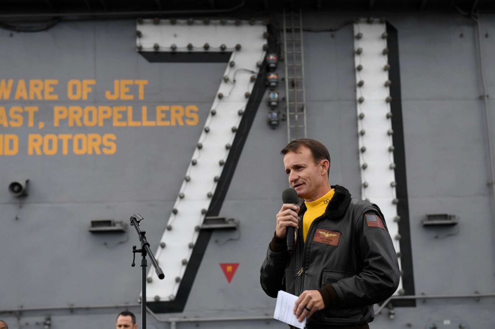 PHOTO: Capt. Brett Crozier, commanding officer of the aircraft carrier USS Theodore Roosevelt (CVN 71), addresses the crew during an all-hands call.