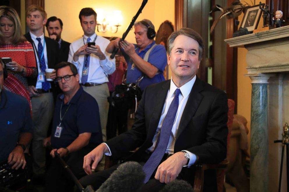 PHOTO: Supreme Court nominee Brett Kavanaugh listens to Sen. Rob Portman on Capitol Hill in Washington, during a meeting, July 11, 2018.