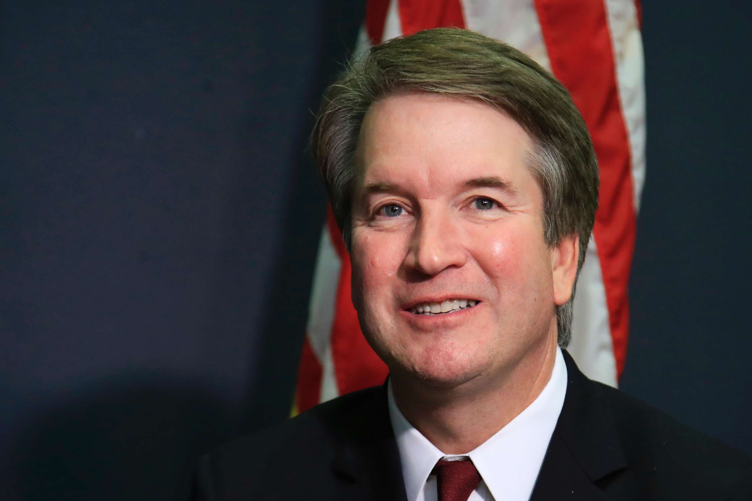 PHOTO: Supreme Court nominee Brett Kavanaugh glances at reporters during a meeting on Capitol Hill in Washington, July 19, 2018.