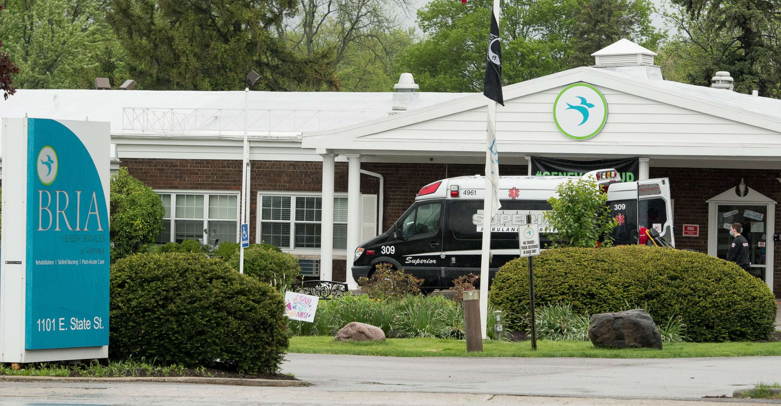 PHOTO: A Superior ambulance prepares to leave Bria of Geneva skilled nursing facility in Geneva, Ill.