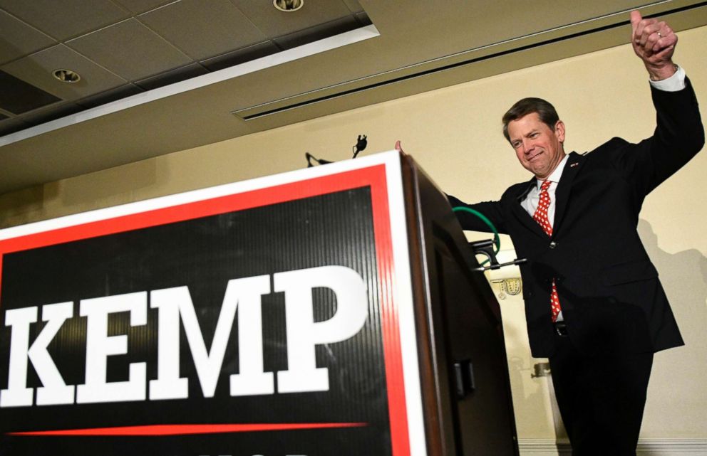 PHOTO: Georgia Secretary of State Brian Kemp, Republican primary candidate for governor approaches the podium to address supporters during an election night results party, May 22, 2018, in Athens, Ga.