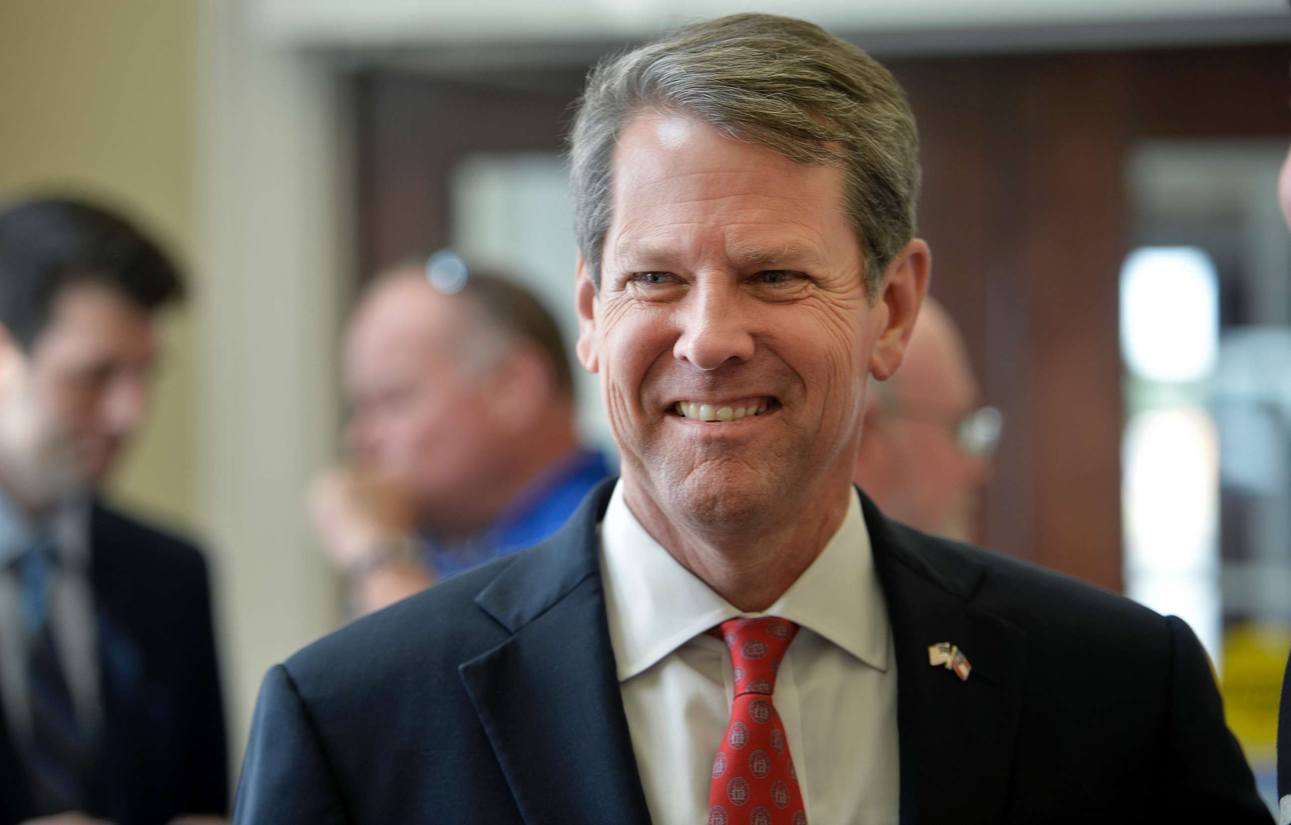 PHOTO: Georgia Secretary of State Brian Kemp talks to voters during a rally in Augusta, Ga., July 23, 2018.