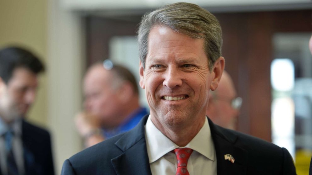 PHOTO: Georgia Secretary of State Brian Kemp talks to voters during a rally in Augusta, Ga., July 23, 2018.
