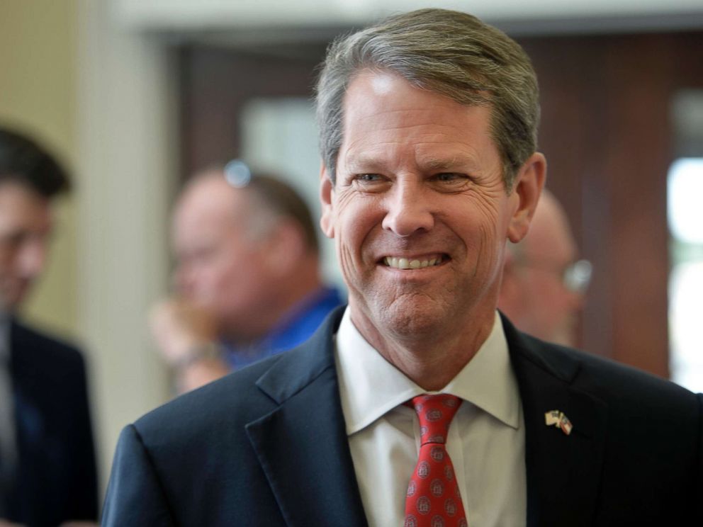 PHOTO: Georgia Secretary of State Brian Kemp talks to voters during a rally in Augusta, Ga., July 23, 2018.