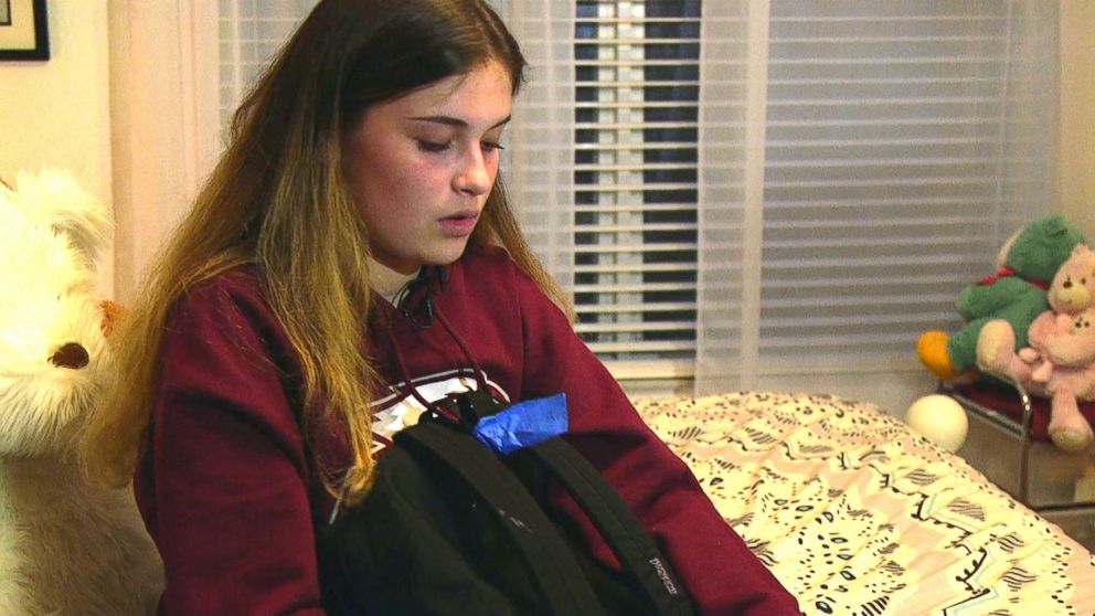 PHOTO: Brooke Harrison, 14, holds her old backpack that was in the classroom with her during the Feb. 14, 2018, shooting at Marjory Stoneman Douglas High School in Parkland, Fla.