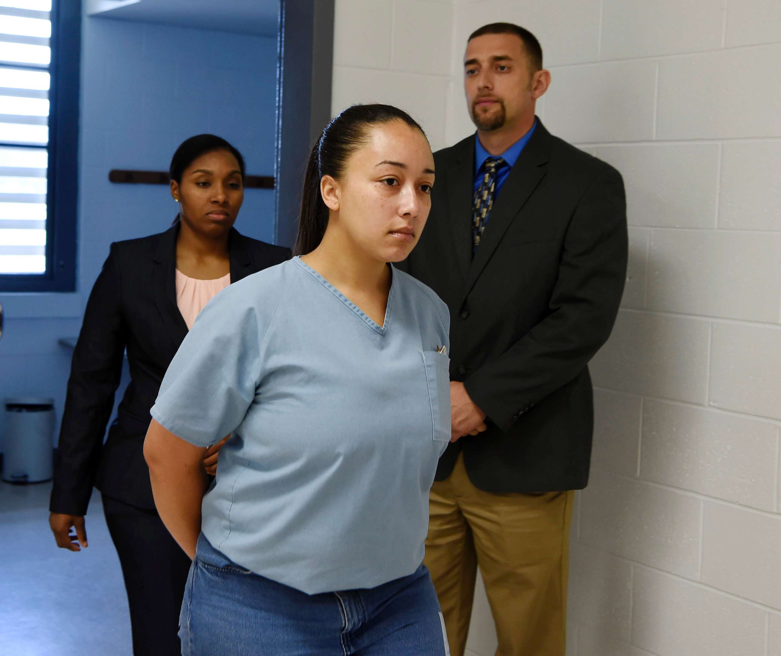 PHOTO: Cyntoia Brown, a woman serving a life sentence for killing a man when she was a 16-year-old prostitute, enters her clemency hearing, May 23, 2018, at Tennessee Prison for Women in Nashville, Tenn.