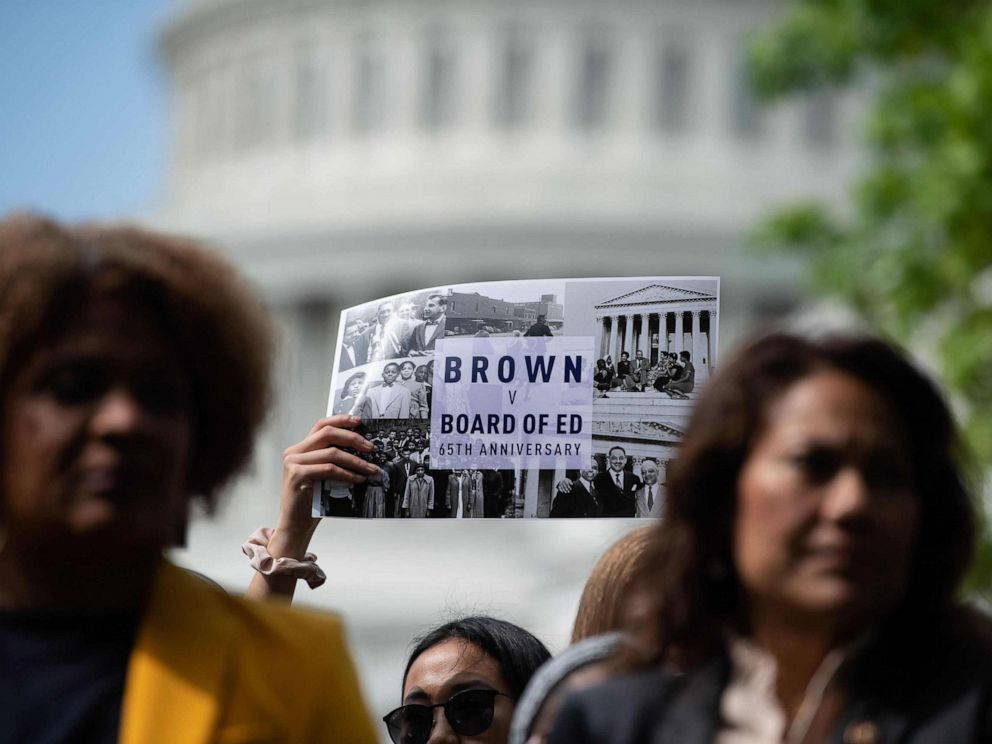 PHOTO: People attend a rally to mark the 65th anniversary of the US Supreme Courts Brown v Board of Education ruling that ended segregation in public schools, near the Capitol in Washington, DC, May 16, 2019.