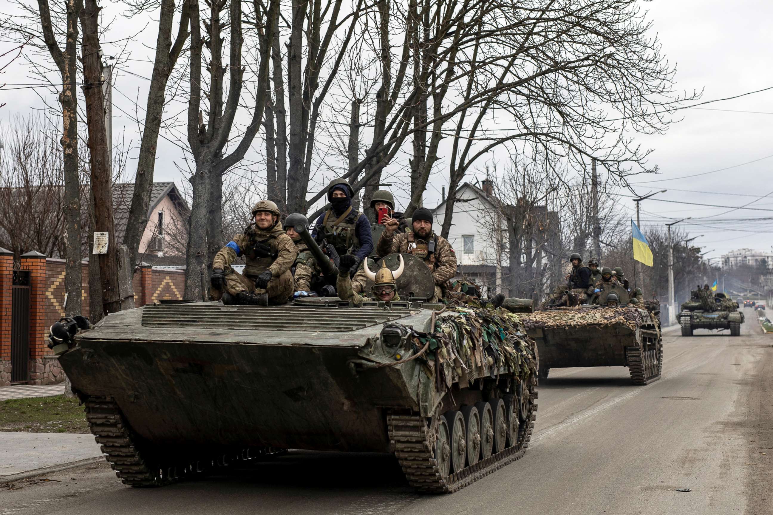PHOTO: Ukrainian soldiers are seen on tanks, amid Russia's invasion of Ukraine, in Bucha, Kyiv region, Ukraine, April 6, 2022.