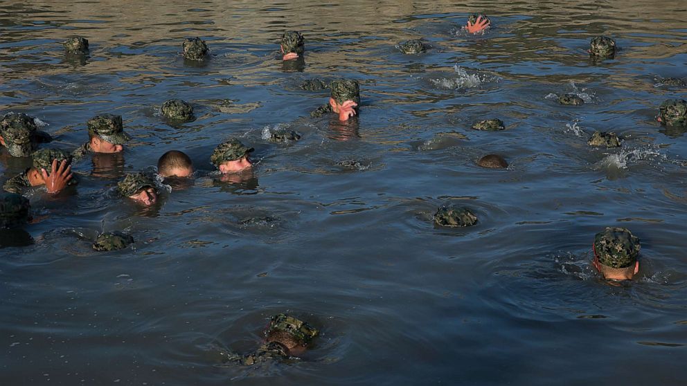 PHOTO: U.S. Navy SEAL candidates participate in Basic Underwater Demolition/SEAL (BUD/S) training, in the waters off Coronado, Calif., April 13, 2018