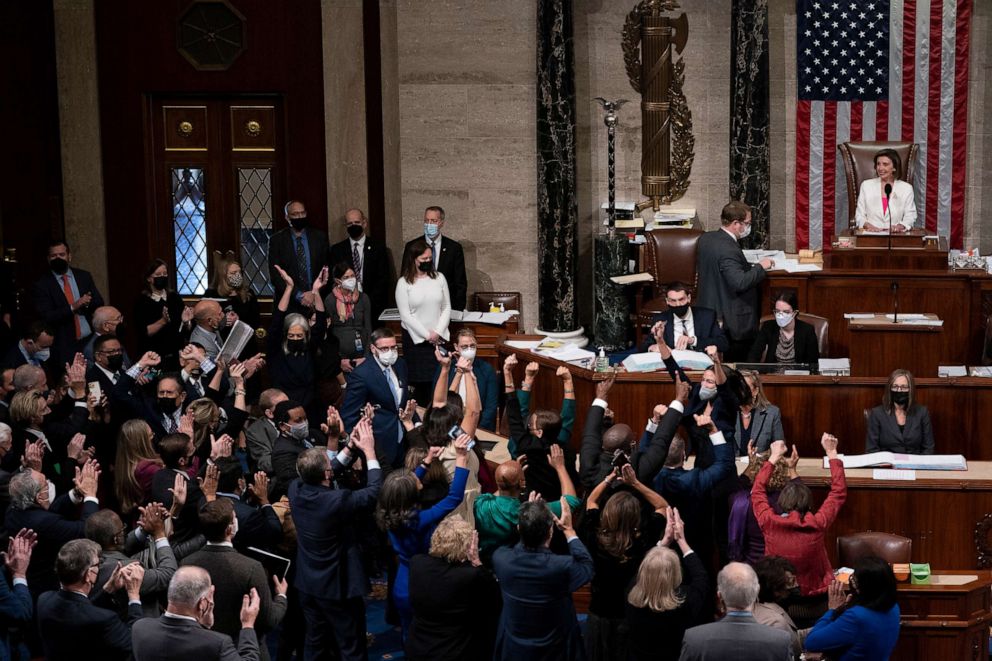 PHOTO: House Democrats cheer as Speaker of the House Nancy Pelosi presides over the vote for the Build Back Better Act at the Capitol, Nov. 19, 2021.