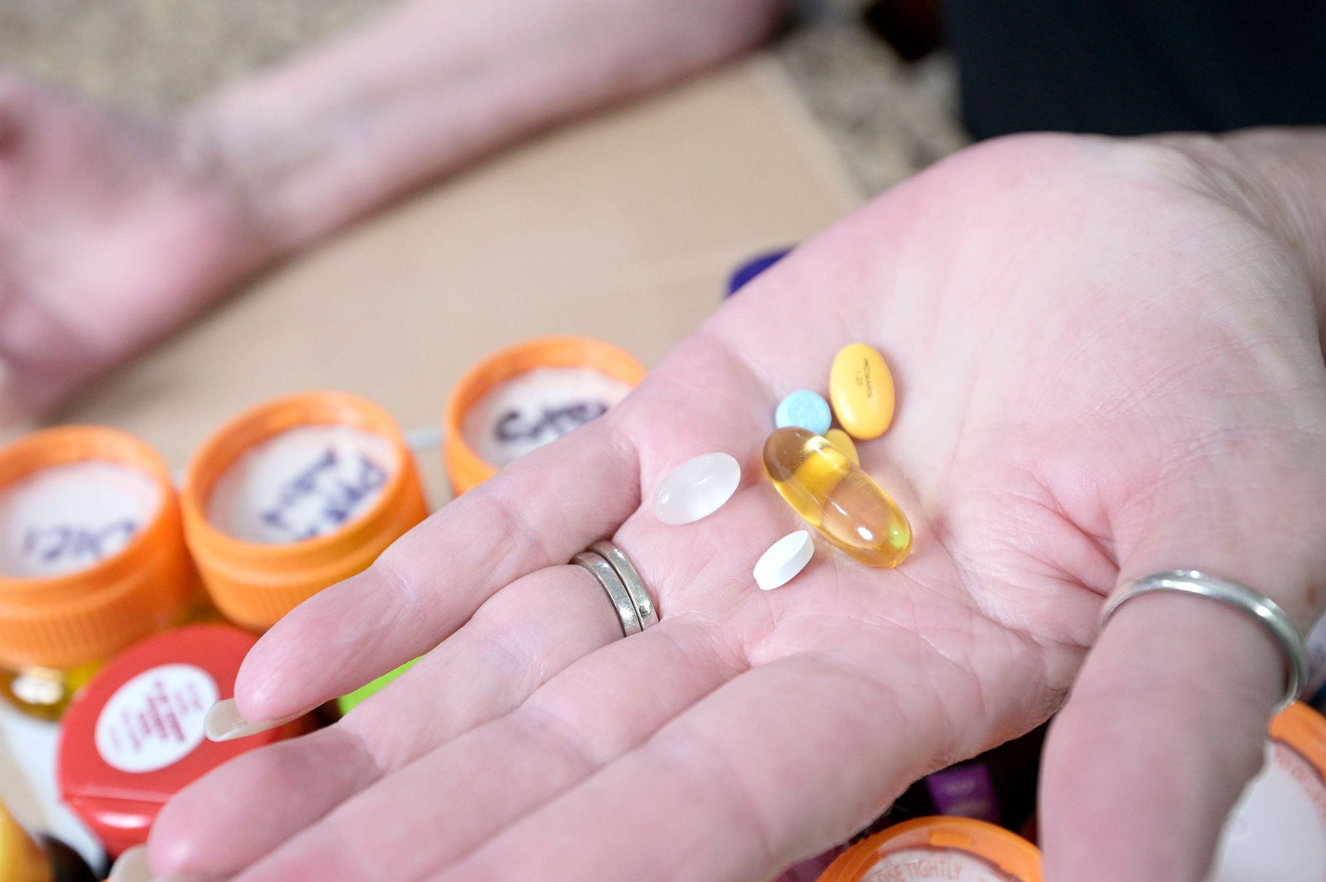 PHOTO: Retiree Donna Weiner shows some of the daily prescription medications that she needs and pays over $6,000 a year through a Medicare prescription drug plan at her home in Longwood, Fla., Oct. 5, 2021. 