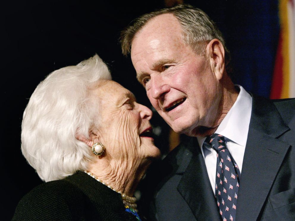 PHOTO: Former U.S. President George Bush speaks with his wife Barbara as their son, Florida Republican gubernatorial candidate, incumbent Gov. Jeb Bush, celebrates victory at his election night party in Miami, Nov. 5, 2002.