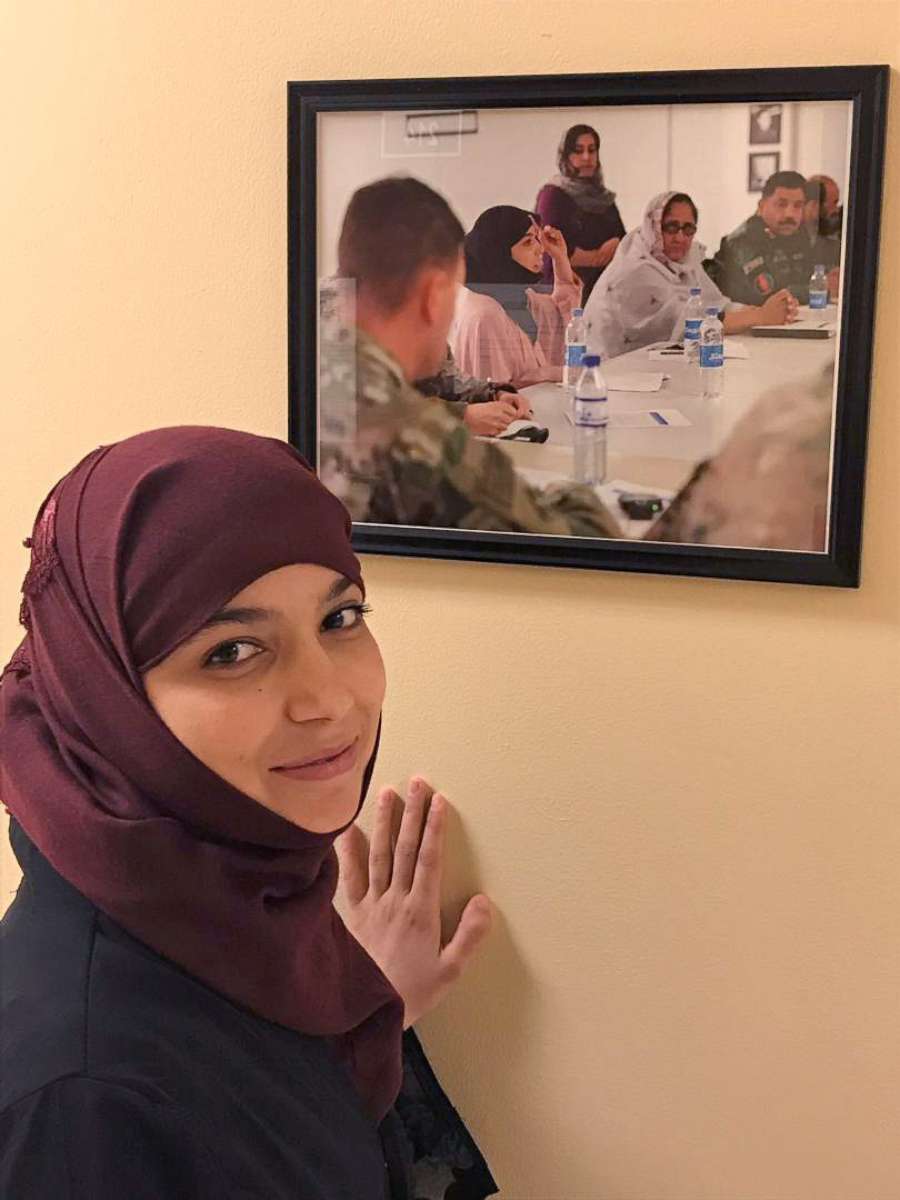 PHOTO: Sarina Faizy is pictured next to an image of her at the Bush Institute in 2018.
