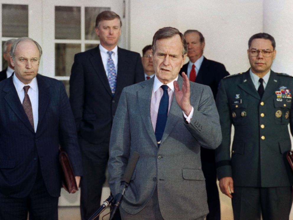 PHOTO: President George H.W. Bush talks to reporters in the Rose Garden of the White House after a meeting to discuss the Persian Gulf War. From left, Dick Cheney, Dan Quayle, John Sununu, the president, James A. Baker III, and Gen. Colin Powell.